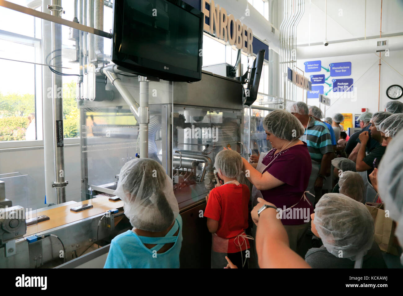 Visitors in Creatyourown candy bar in Hershey's Chocolate World