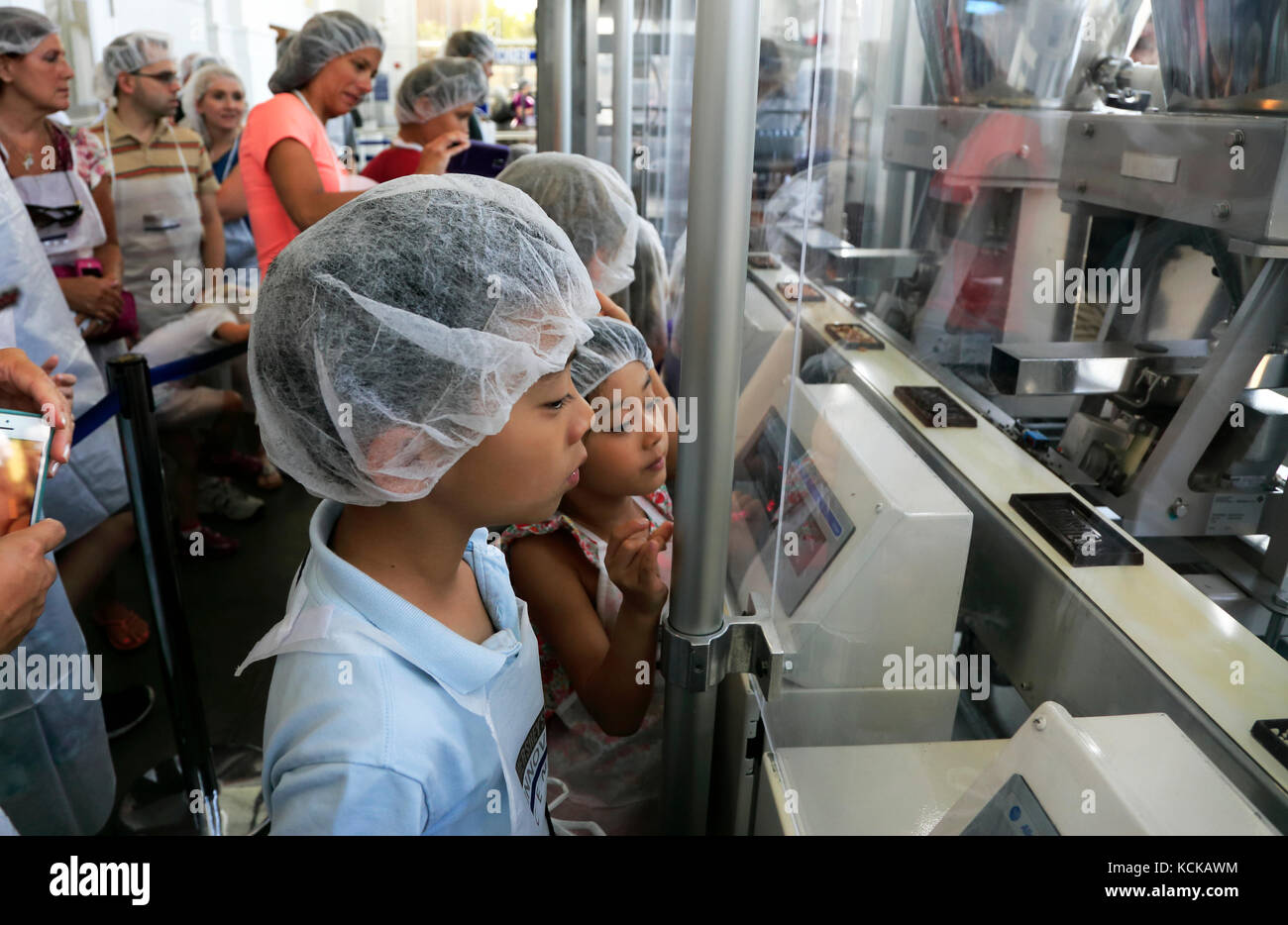 Visitors in Creatyourown candy bar in Hershey's Chocolate World