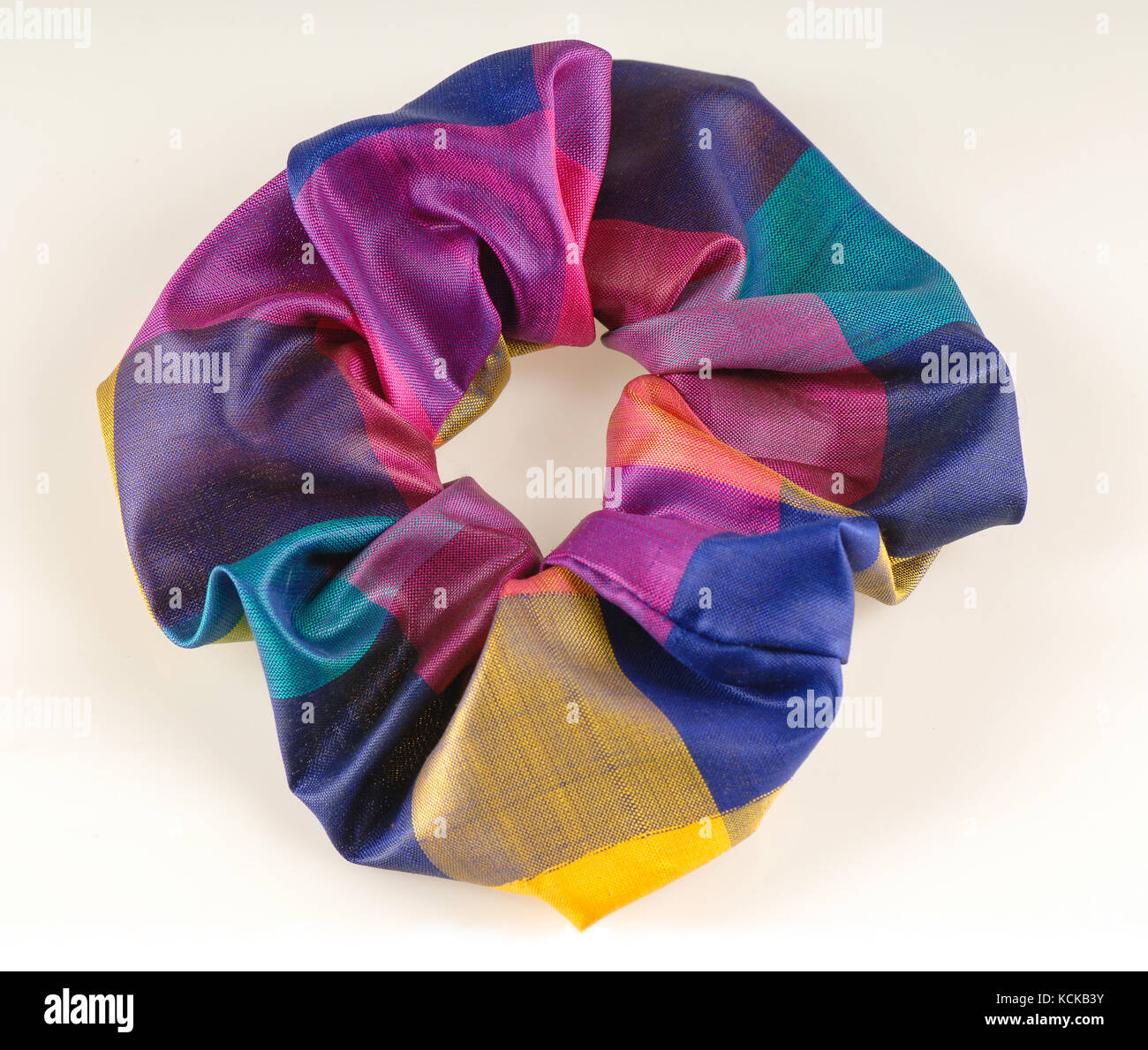 colorful elastic band for hair on white background top view Stock Photo