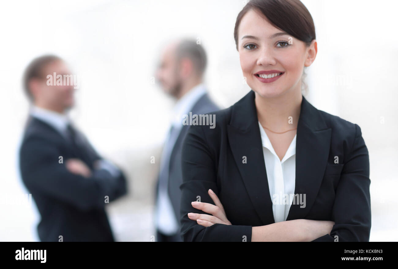 successful young business woman on the background of the office Stock ...