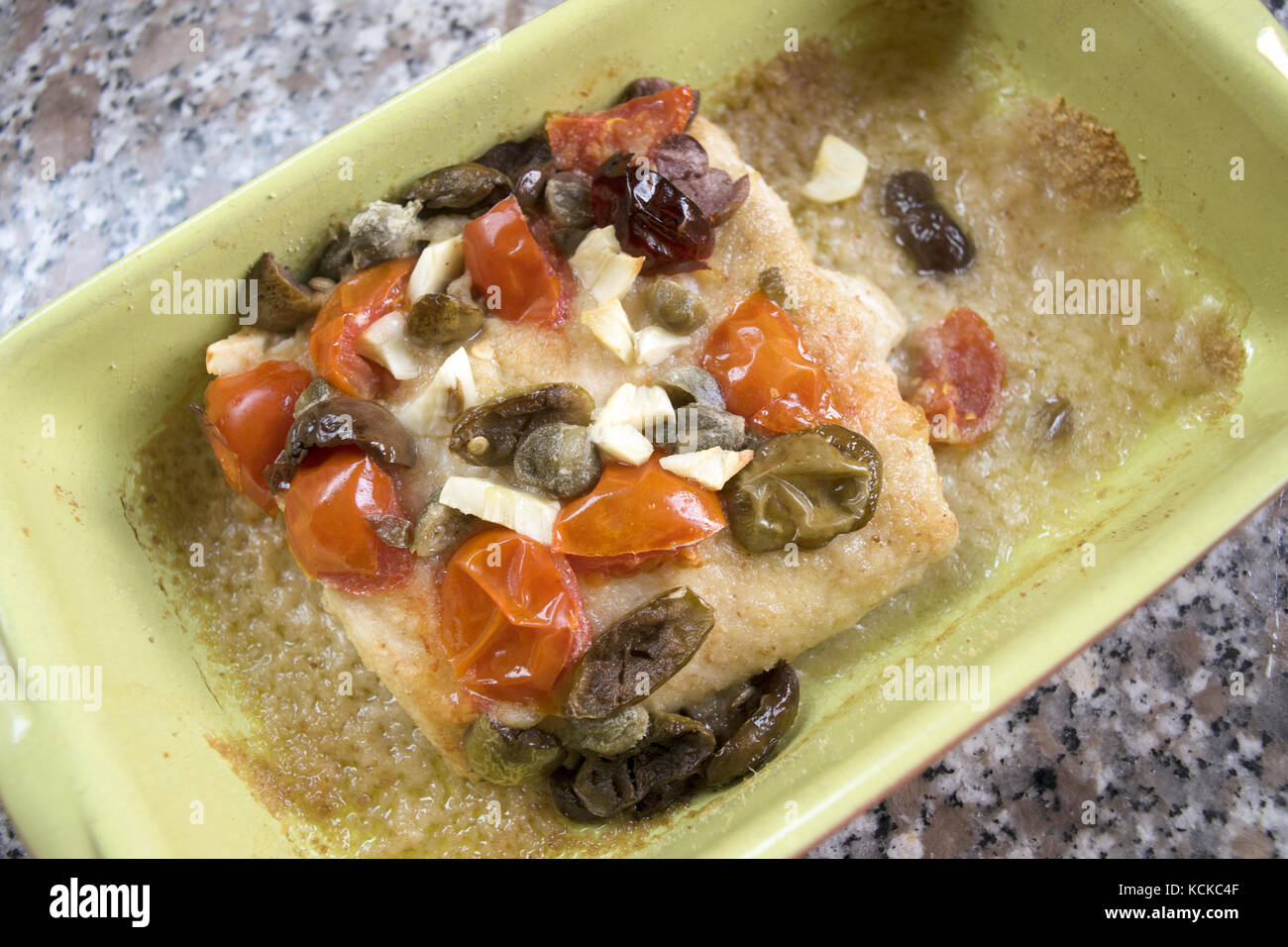 cod fish fillet at the mediterranean style Stock Photo - Alamy