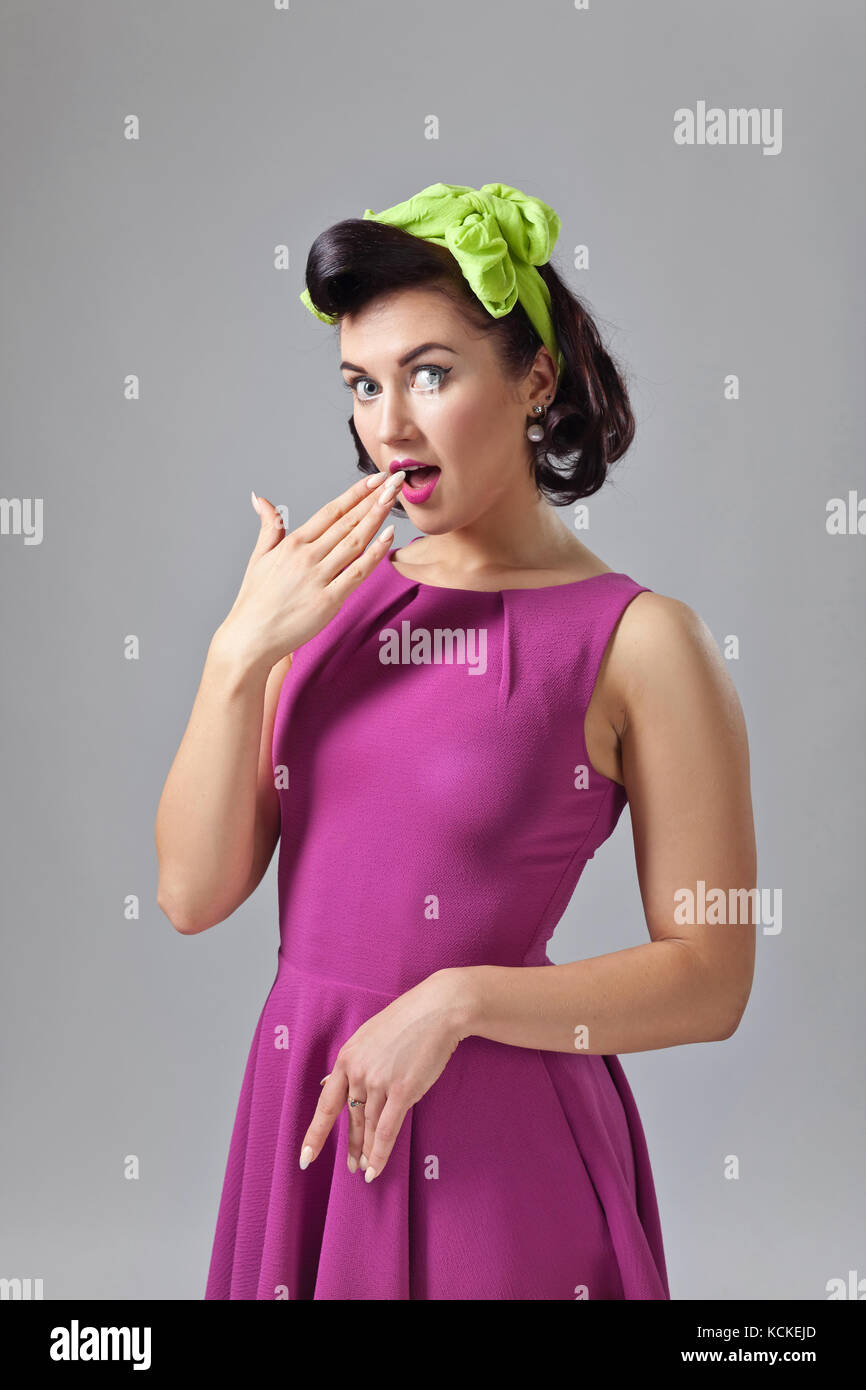 Beautiful Surprised Woman In Pin Up Style With Perfect Hair And