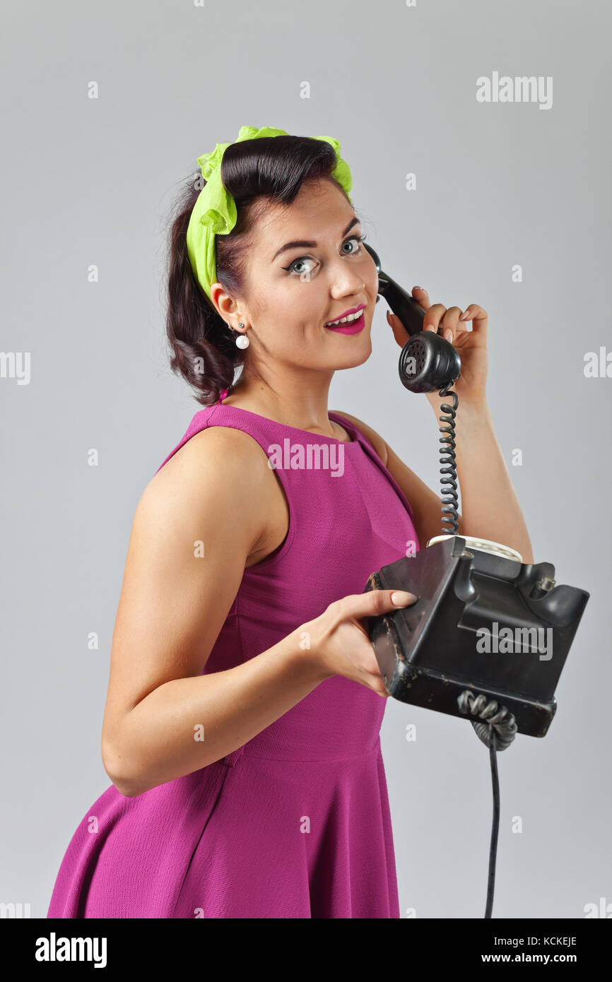 Beautiful Brunette Woman In Pin Up Style With Perfect Hair And