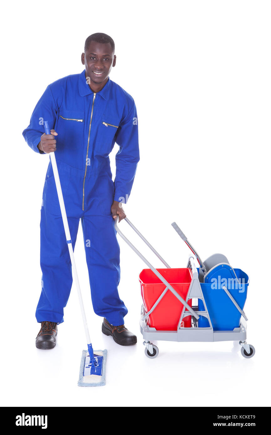 Portrait Of Happy Cleaner Cleaning With Mop Over White Background Stock Photo