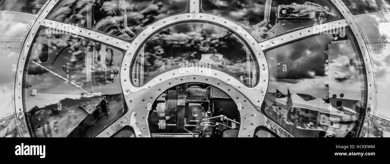 The sky reflecting off the front of a World War Two bomber’s cockpit. Stock Photo