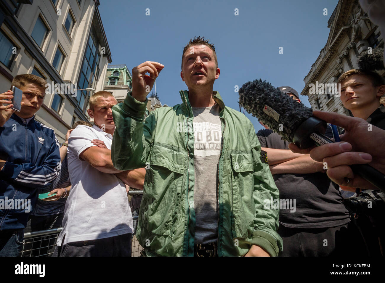 Tommy Robinson, leader of the English Defence League (EDL), speaks to press outside Old Bailey court in London, UK. Stock Photo