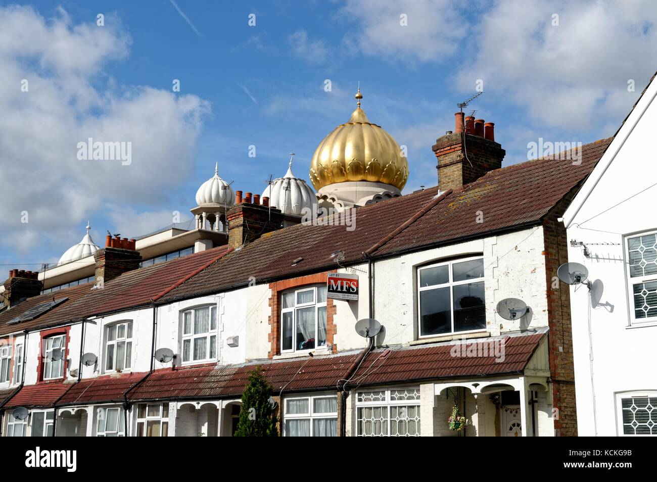 The Golden Dome of Gurdwara Sri Guru Singh Sabha  Southall West London UK Stock Photo