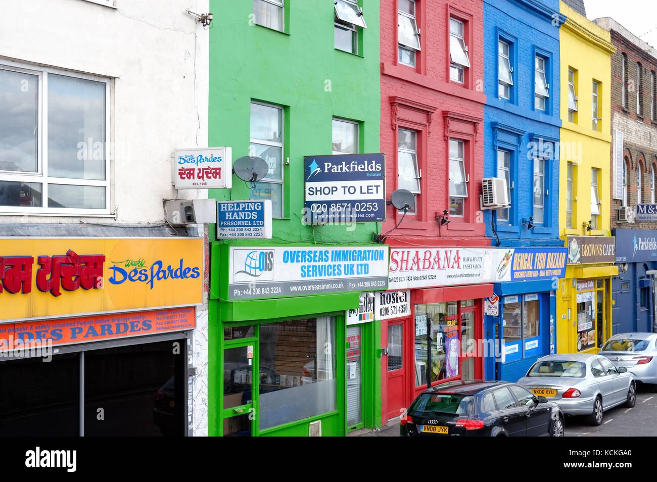 Colourful shop facades in Southall West London UK Stock Photo