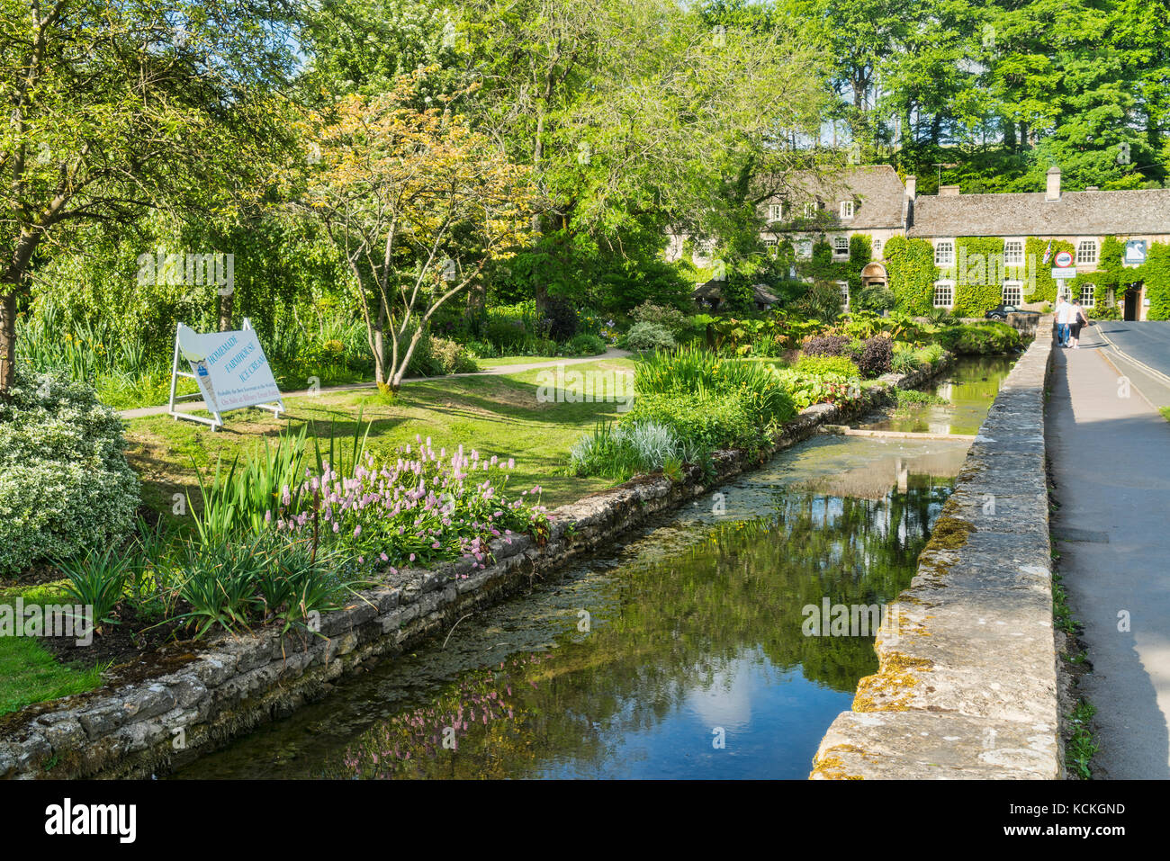 River, trout farm, and swan Hotel, Bibery, near Arlington Row, Cotswolds, England; UK Stock