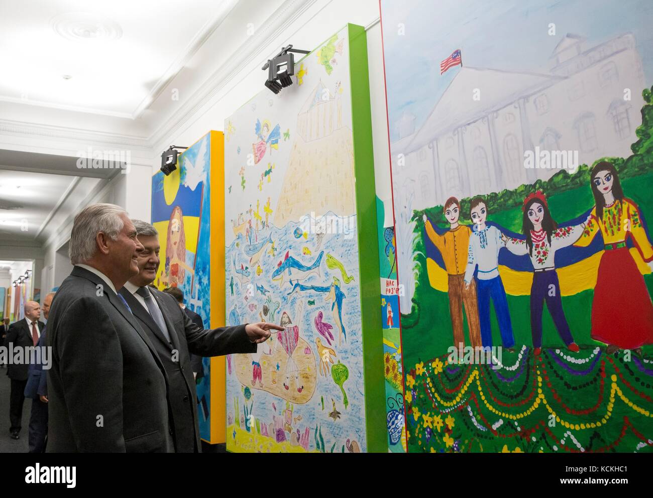 Ukrainian President Petro Poroshenko (left) gives U.S. Secretary of State Rex Tillerson a tour of the My Flag Goes Where I Go art exhibit painted by children around the world July 9, 2017 in Kyiv, Ukraine.    (photo by State Department Photo via Planetpix) Stock Photo