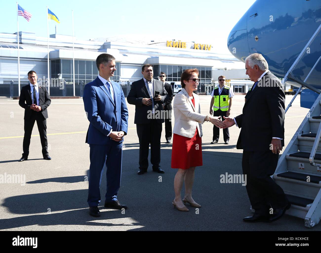 U.S. Ambassador to Ukraine Marie Yovanovitch (left) greets U.S. Secretary of State Rex Tillerson as he arrives at the Kyiv Boryspil Airport July 9, 2017 in Kyiv, Ukraine.    (photo by State Department Photo via Planetpix) Stock Photo
