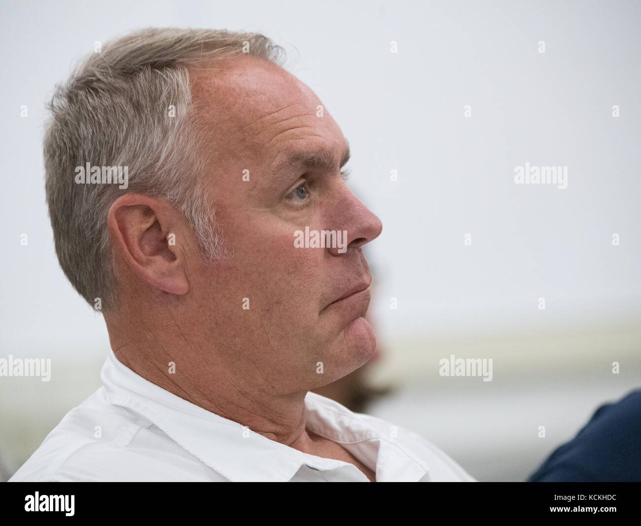 U.S. Secretary of the Interior Ryan Zinke listens to USDA and local forest service officials during an overview on the forest fire situation in the Northern Rockies and the Lola National Forest August 24, 2017 in Missoula, Montana.    (photo by Lance Cheung  via Planetpix) Stock Photo
