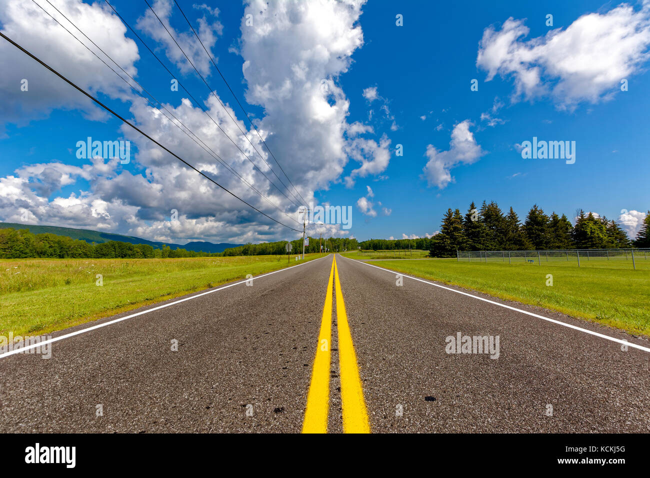 Summer view with road in Northern New-York State Stock Photo