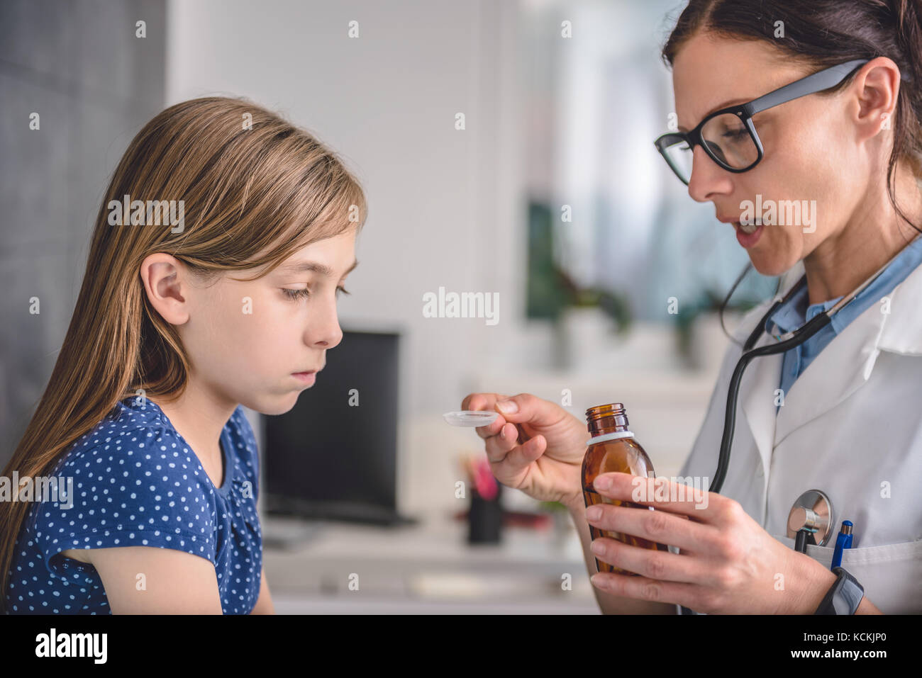 Sick girl receiving treatment at the hospital Stock Photo