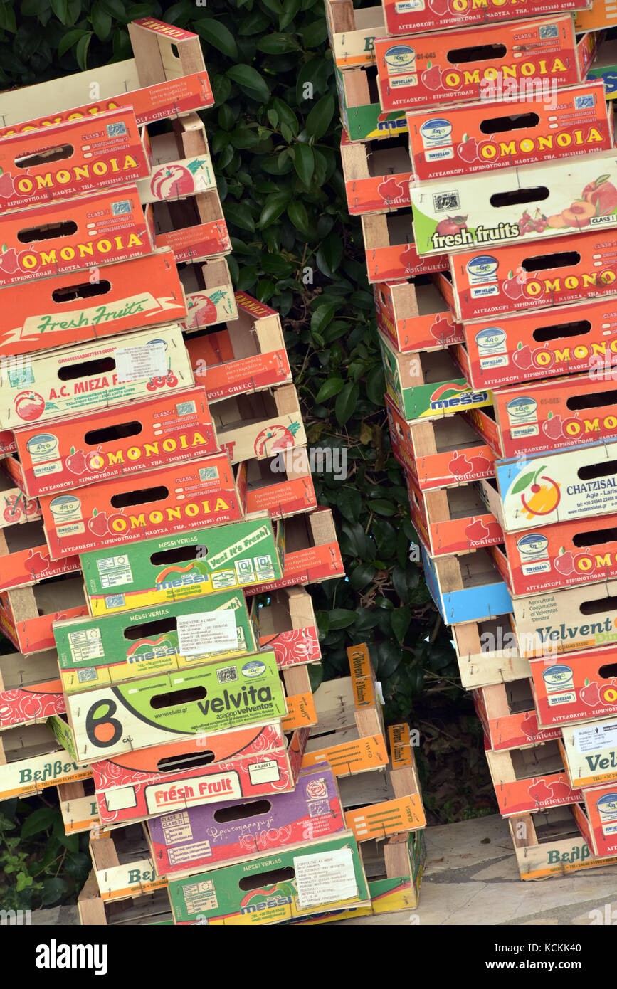 stacks of colourful wooden packing crates for fresh fruit and