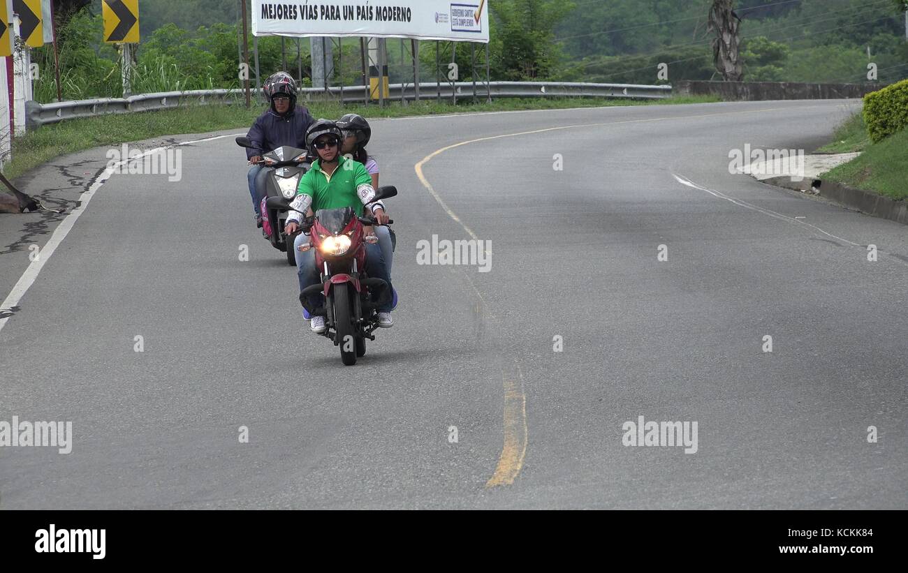 Riding Motorcycles On Curvy Road Stock Photo