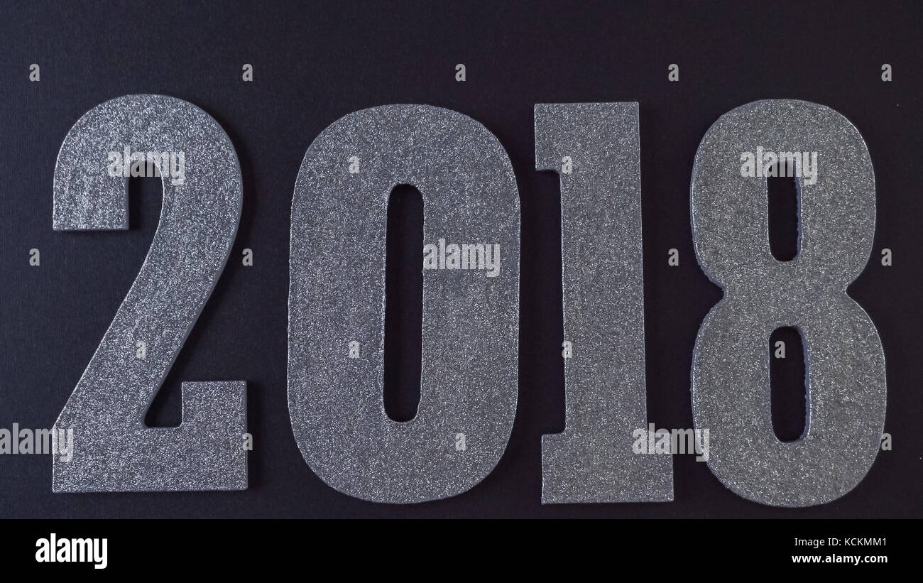 Silver numbers of 2018 Year on a black background Stock Photo - Alamy
