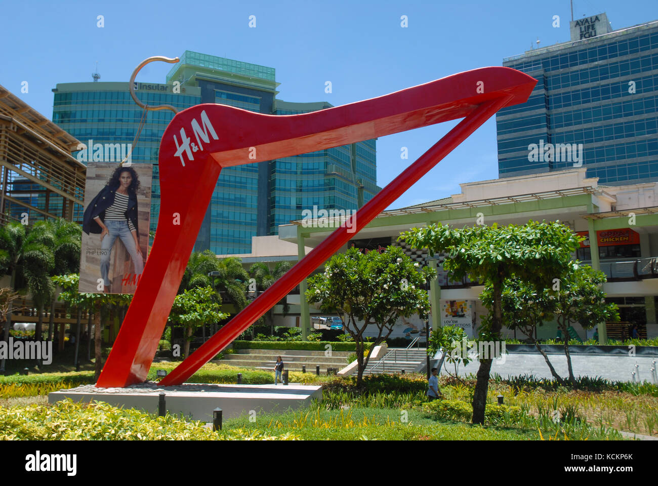 Giant red clothes hanger in the gardens of the Ayala Centre, Cebu City