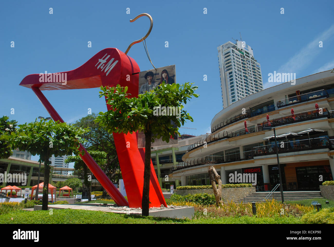 Giant red clothes hanger in the gardens of the Ayala Centre, Cebu City