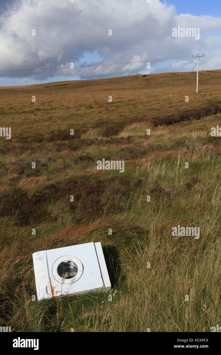 Fly-tipped washing machine on Isle of Lewis, Outer Hebrides, Scotland Stock Photo