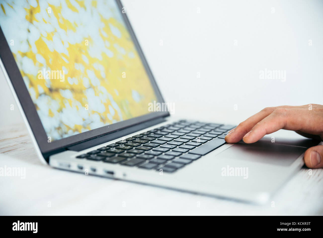 hand using touchpad on laptop Stock Photo Alamy