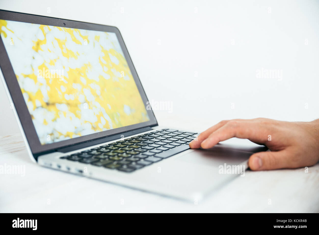 hand using touchpad on laptop Stock Photo Alamy