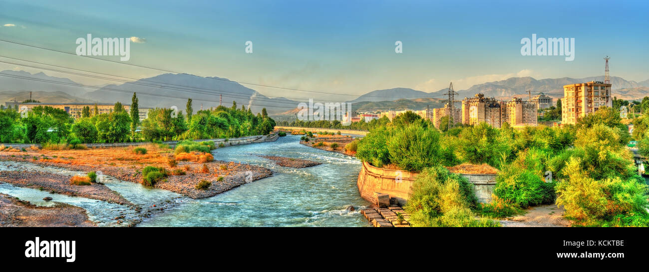 View of Dushanbe with the Varzob River and the Pamir-Alay mountains. Tajikistan, Central Asia Stock Photo