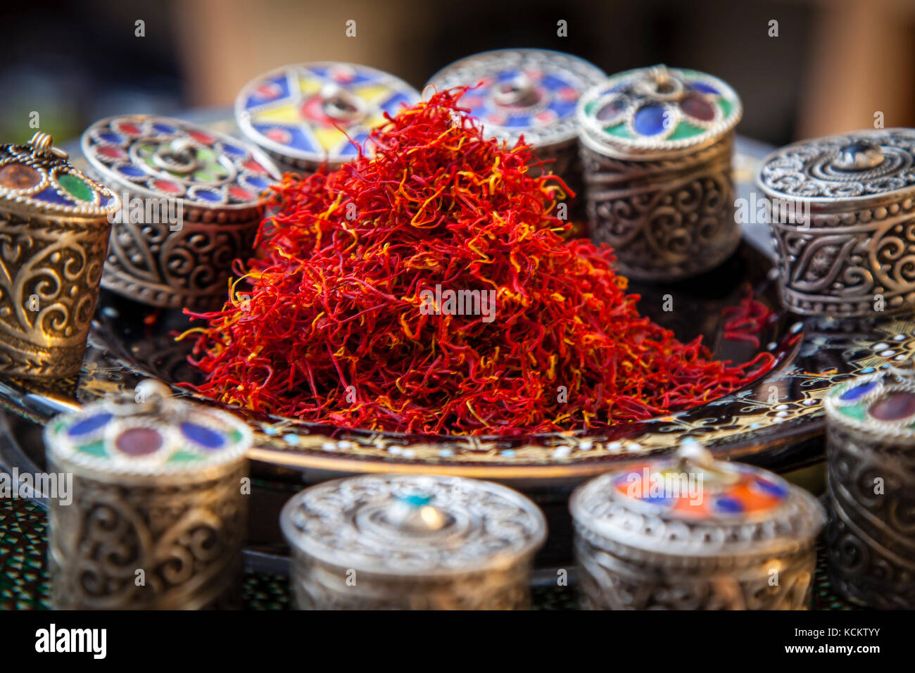 Saffron together with Moroccan trinket boxes in moroccan decoration Stock Photo
