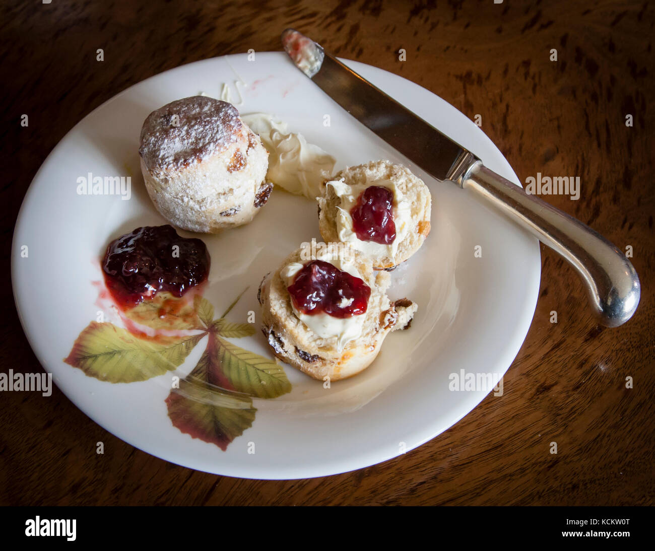Devonshire Tea. The heart of every cream tea: scones with clotted cream and strawberry jam Stock Photo
