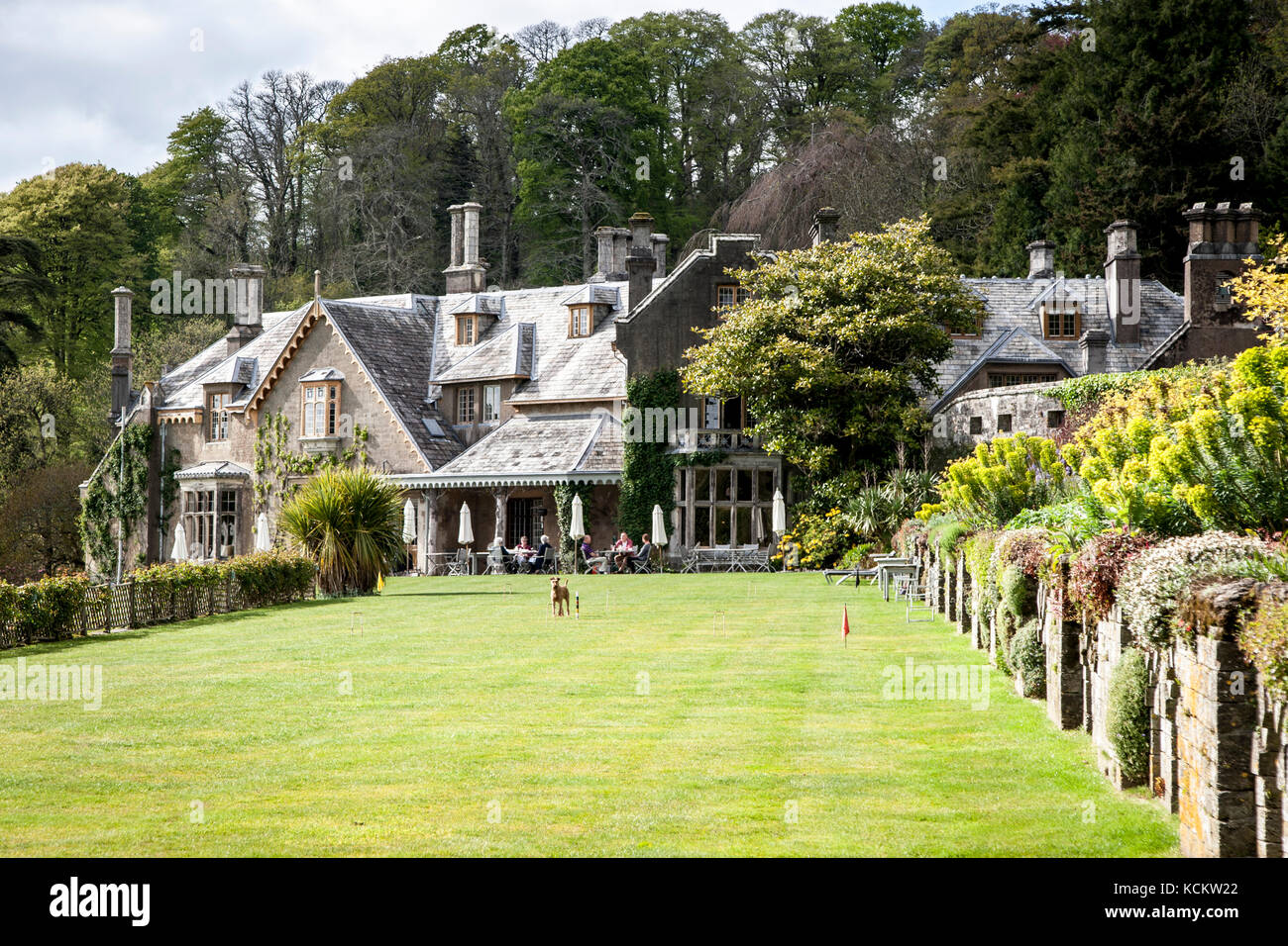 A variety of garden games can be played on the green along the longest decorative patch in England. Hotel Endsleigh in the Lawn Stock Photo