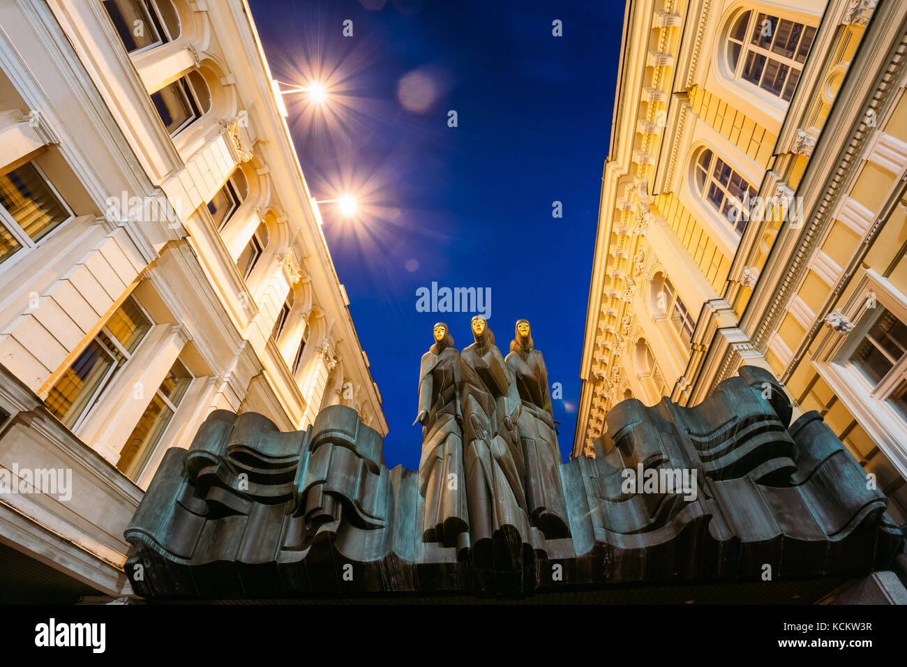 Vilnius, Lithuania - July 8, 2016: Close The Black Sculpture Of Three Muses On Facade Of Lithuanian National Drama Theatre Building, Main Entrance, Bl Stock Photo