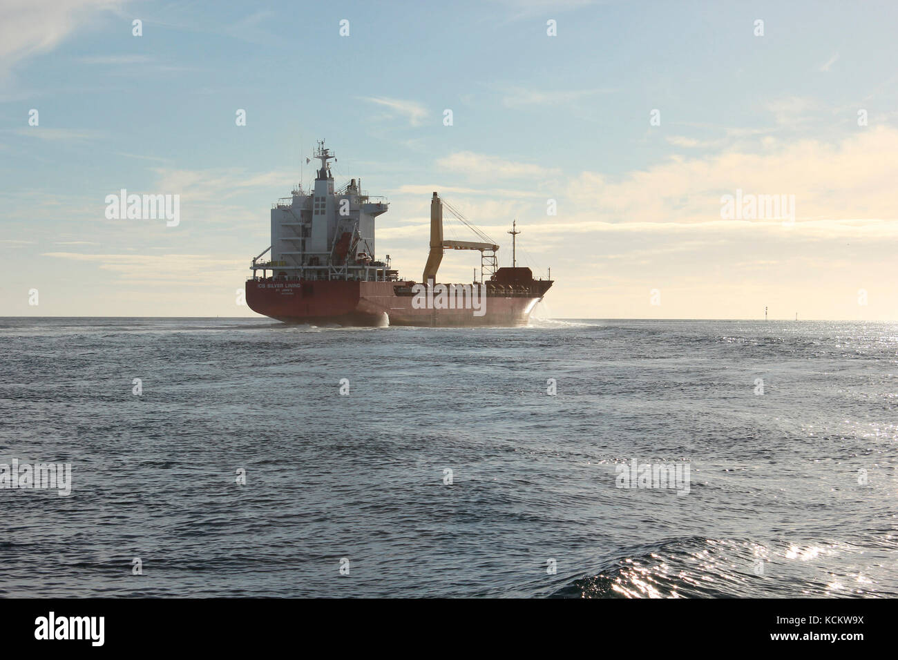 Container ship leaving the port of Bell Bay and heading down the Tamar