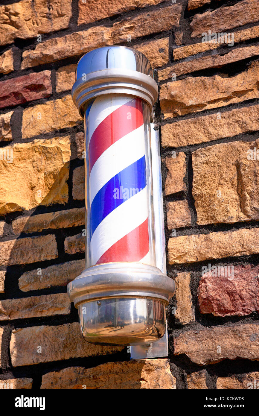 Barbers shop pole on a wall in downtown Lebanon Tennessee USA Stock