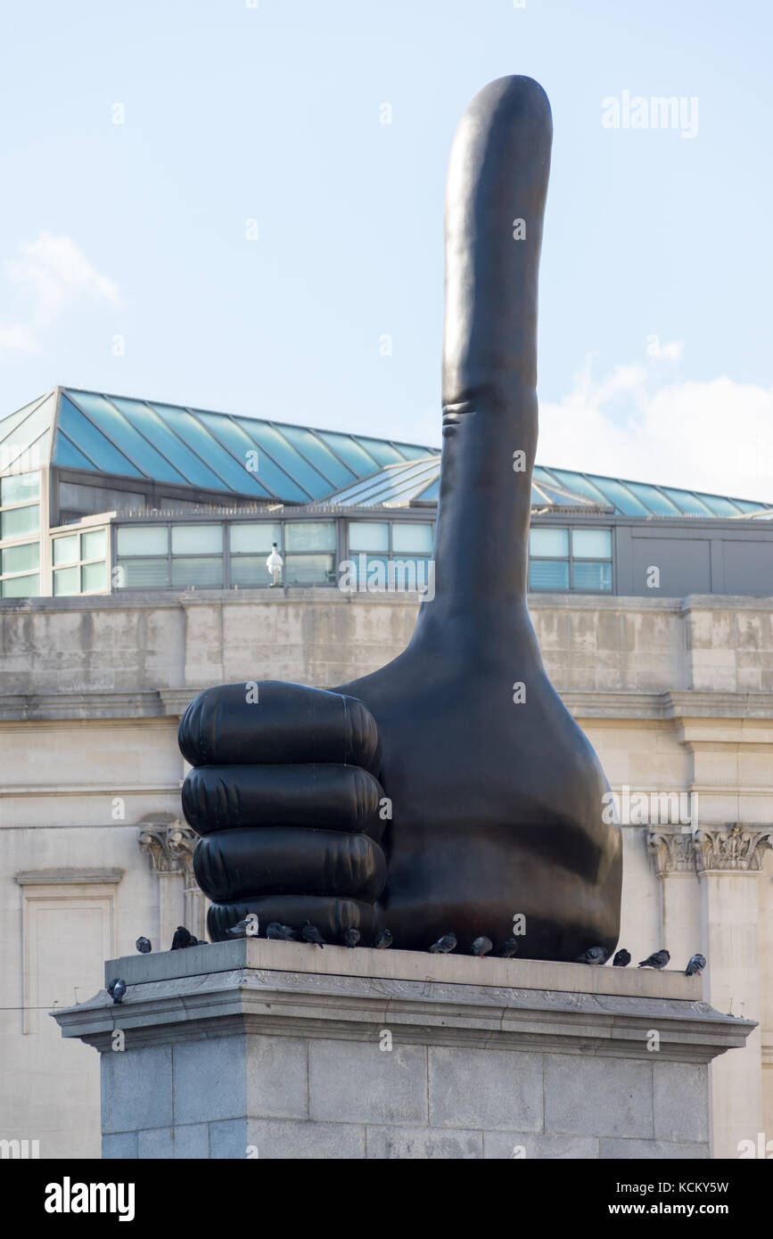 An elongated black bronze thumb sculpture by David Shrigley on the fourth plinth, Trafalgar Square, London, England, UK, October 2017. Stock Photo