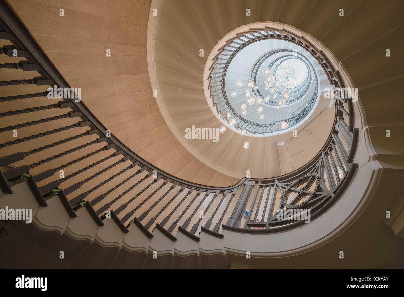Colour image of Cecil Brewer's spiral staircase in Heals Department Store, Tottenham Court Road, London UK Stock Photo