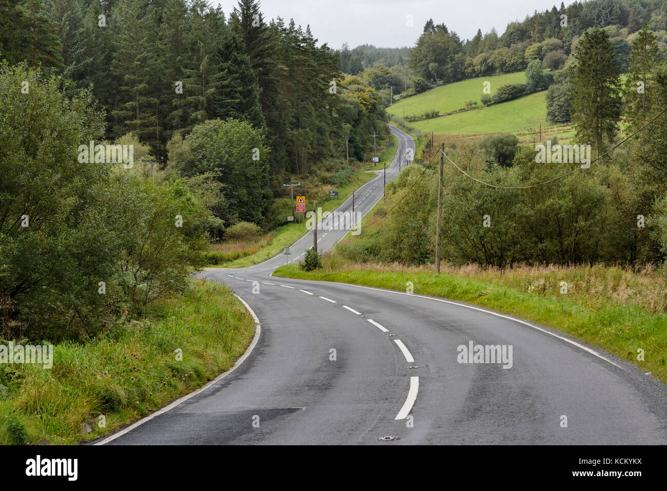 The B5105 road running through Clocaenog Forest between Rhuthun and Cerrig y Druidion in Clwyd, North Wales. Clocaenog Forest is a large scenic forest Stock Photo