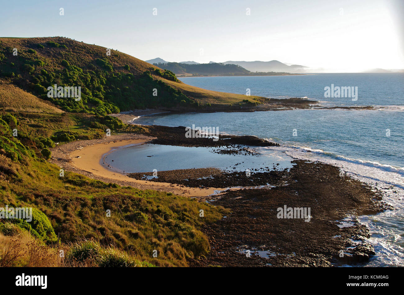 A curious semi-circular area of basalt extrusion at Don Heads, exposed by wave action that has eroded wave-cut platforms. Stock Photo