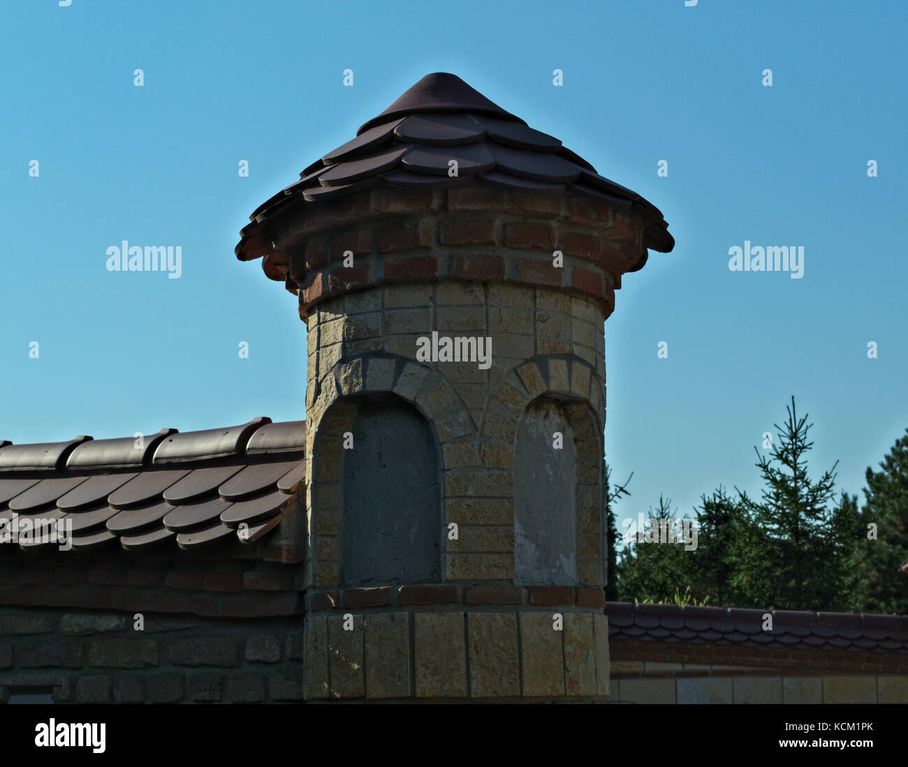 Small bricks tower on Kac Monastery fence Stock Photo