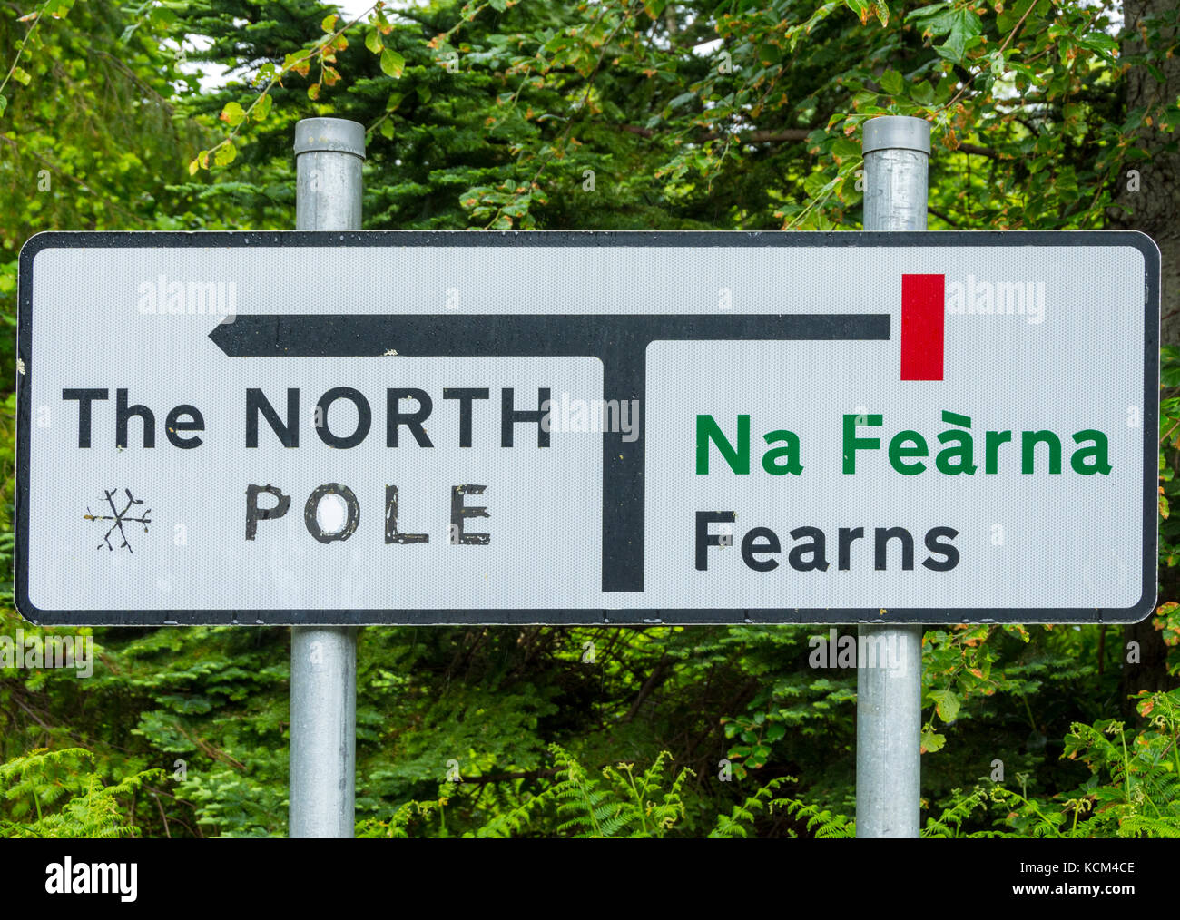 Road sign, to which someone has added the word 'Pole', at Inverarish, Isle of Raasay, Scotland, UK Stock Photo