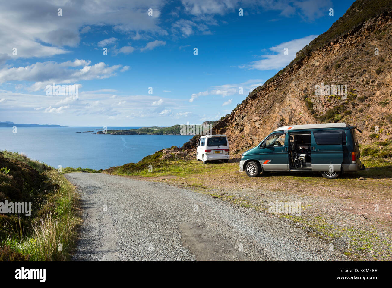 Two Mazda Bongo camper vans on Calum's Road above Loch Arnish, Isle of Raasay, Scotland, UK. Stock Photo