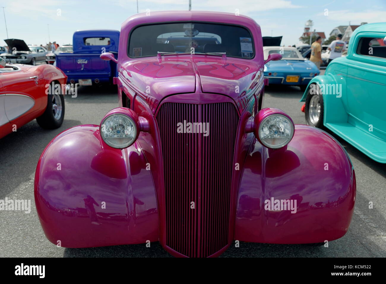A magenta colored roadster  on display at the annual  Endless Summer Cruisin, Ocean City, Maryland, USA. Stock Photo
