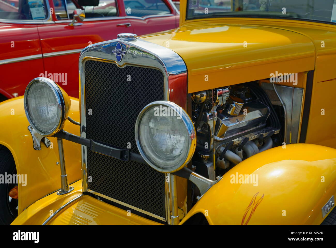 Yellow Ford Hot Rod on display at the annual  Endless Summer Cruisin, Ocean City, Maryland, USA. Stock Photo