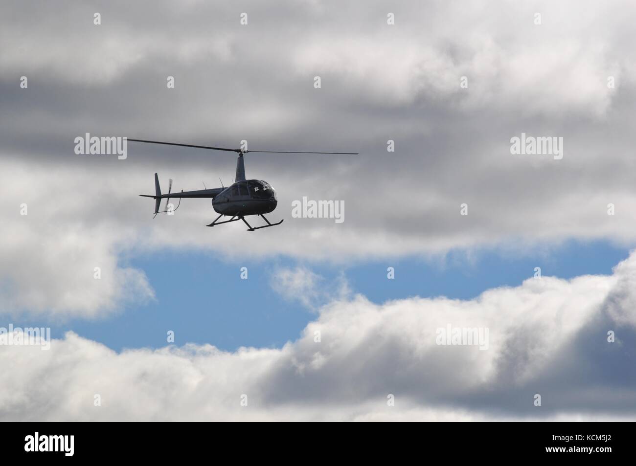 Flying helicopter Stock Photo