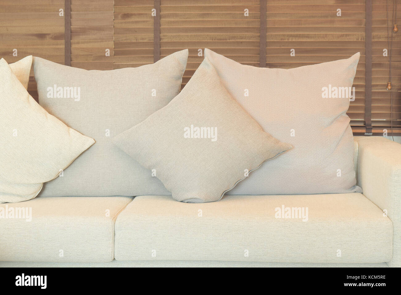 Beige color sofa set in the living room Stock Photo - Alamy