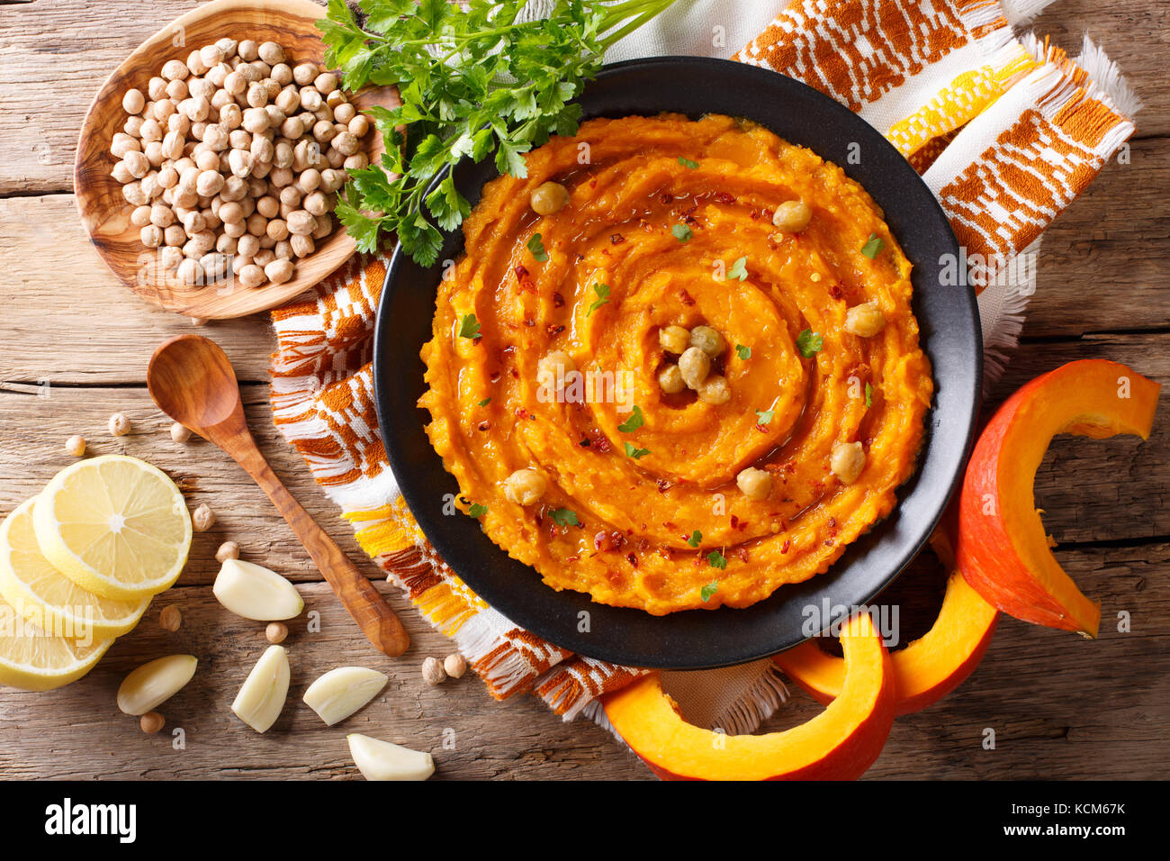 Middle Eastern food pumpkin hummus with ingredients closeup on the