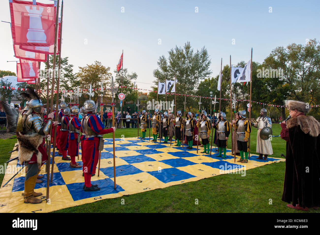 Performance devoted to the Battle of Vienna 1683 as a chess game staged by live playing pieces at the foot of Pultusk Castle in Mazovia, Poland. Stock Photo