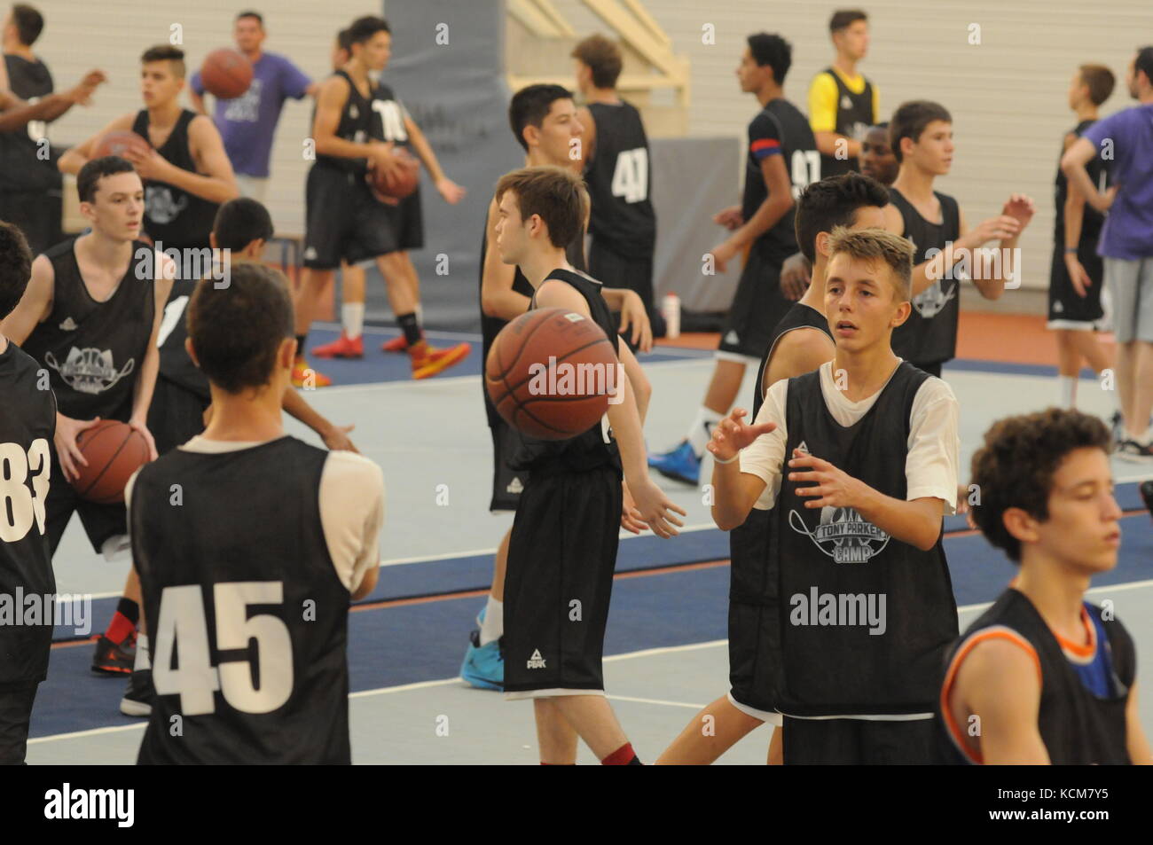 Young basketball players attend Tony Parker summer camp, Villeurbanne,  France Stock Photo - Alamy