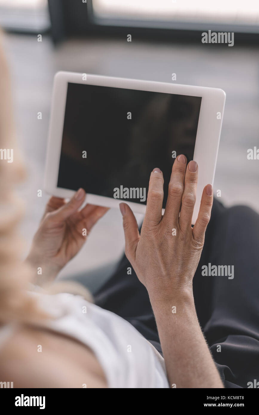 woman using digital tablet Stock Photo - Alamy