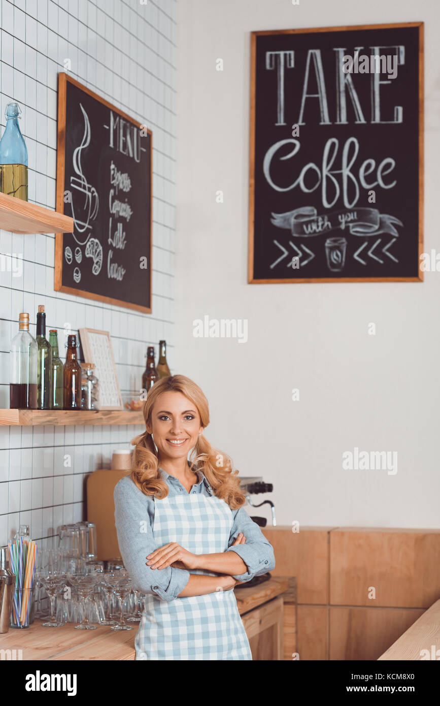 smiling coffee shop owner Stock Photo Alamy