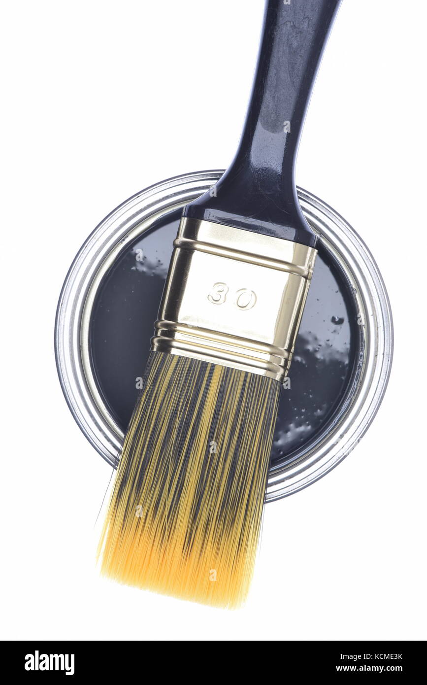 Paintbrush and can with steel color paint isolated on white background